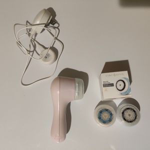 SOLD Clarisonic mia 1 pink cleansing brush with extra brush heads